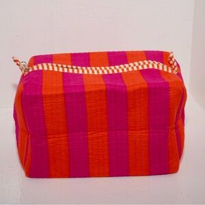 Vibrant Pink and Orange Striped Cloth Cosmetic Bag with Zipper Closure